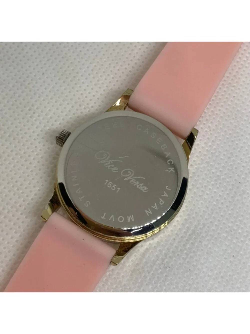 Vice Versa women Floating blue Stones Watch gold toned 30mm quartz pink running